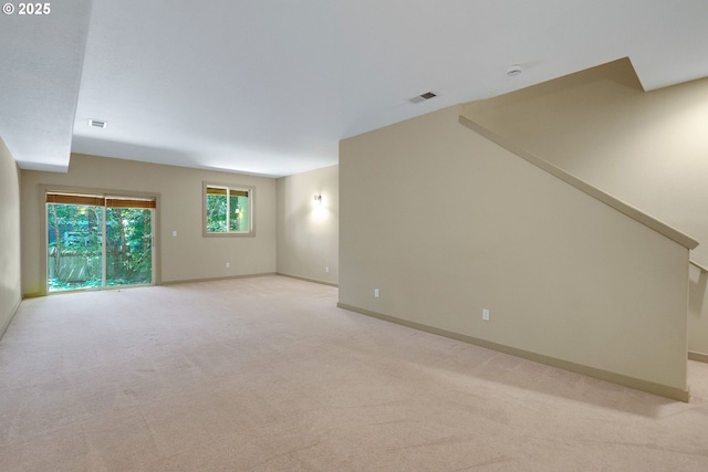 9400 SW 153rd Ave, Beaverton, OR 97007 - unfurnished living room with light carpet and baseboards