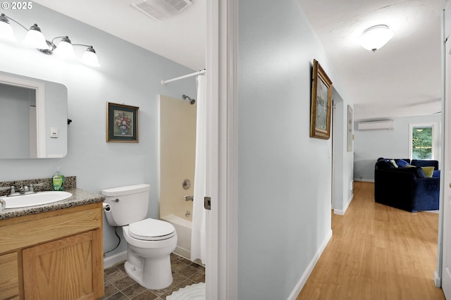3580 Wilshire Ln, Eugene, OR 97405 - bathroom featuring a wall mounted AC, vanity, and shower / washtub combination