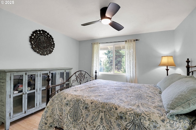 3580 Wilshire Ln, Eugene, OR 97405 - bedroom with light wood-style floors and ceiling fan