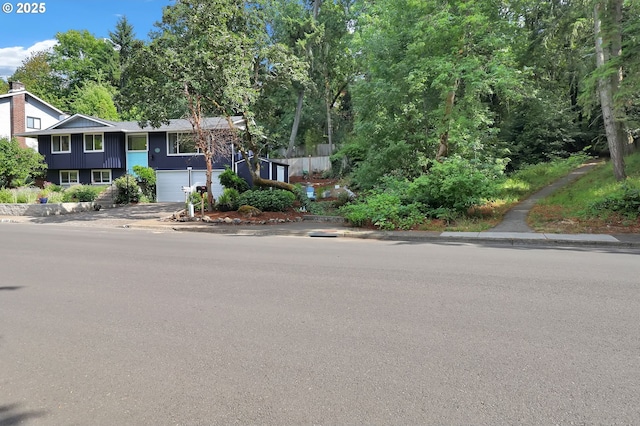 3580 Wilshire Ln, Eugene, OR 97405 - view of front facade with a garage and concrete driveway