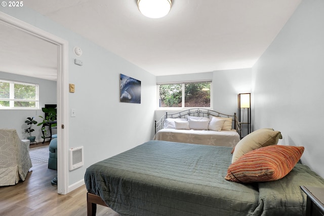 3580 Wilshire Ln, Eugene, OR 97405 - bedroom with wood finished floors and heating unit