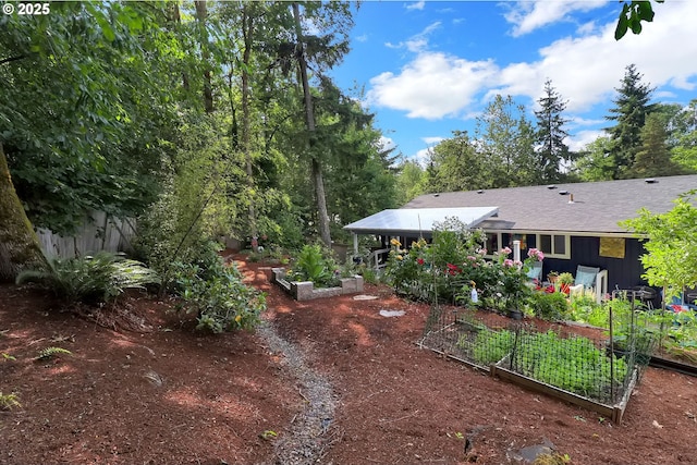3580 Wilshire Ln, Eugene, OR 97405 - back of property with a garden