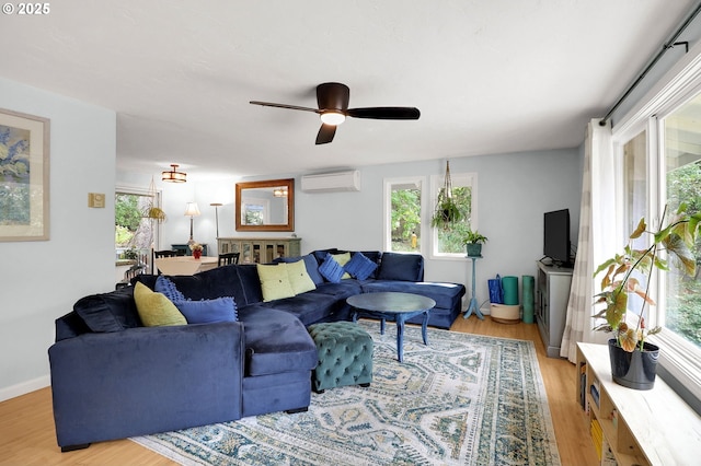 3580 Wilshire Ln, Eugene, OR 97405 - living area featuring light wood finished floors, a wall mounted AC, and plenty of natural light