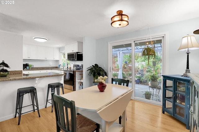 3580 Wilshire Ln, Eugene, OR 97405 - dining space with light wood-type flooring