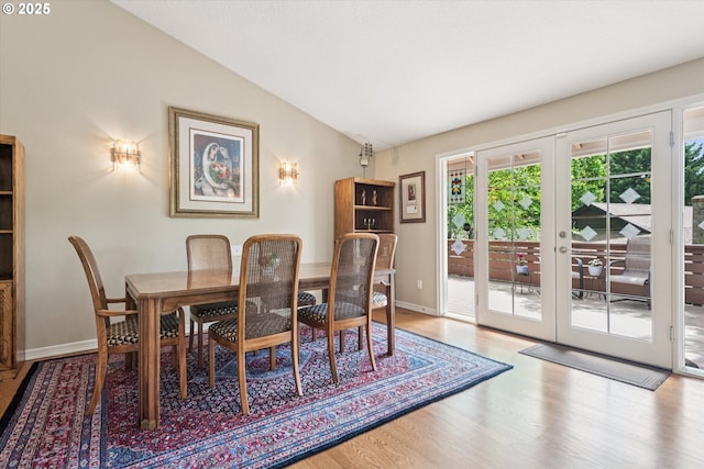 515 SW Colony Dr, Portland, OR 97219 - dining room with vaulted ceiling, wood finished floors, french doors, and baseboards