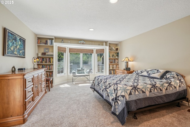 515 SW Colony Dr, Portland, OR 97219 - carpeted bedroom with a textured ceiling and recessed lighting