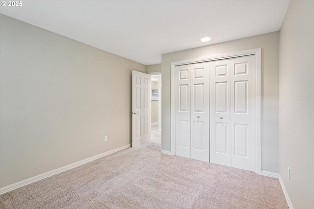 515 SW Colony Dr, Portland, OR 97219 - unfurnished bedroom with carpet flooring, baseboards, a closet, and recessed lighting