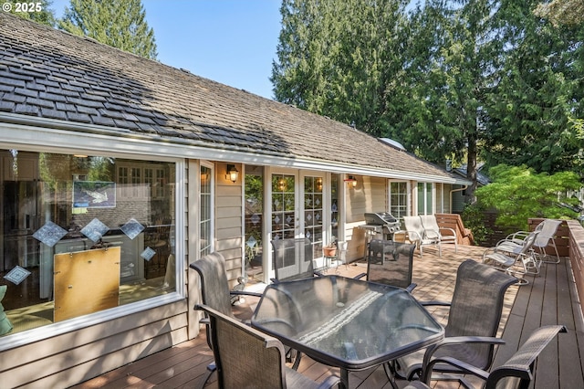 515 SW Colony Dr, Portland, OR 97219 - wooden deck with outdoor dining area and area for grilling