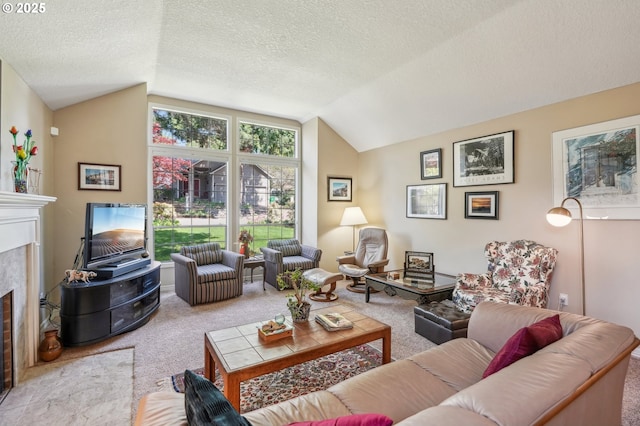 515 SW Colony Dr, Portland, OR 97219 - living room with carpet flooring, lofted ceiling, a fireplace, and a textured ceiling