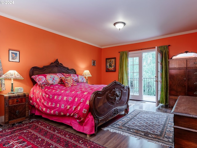 bedroom with crown molding, dark hardwood / wood-style flooring, and access to outside