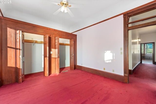 155 N 6th Ave, Elgin, OR 97827 - unfurnished bedroom featuring carpet, multiple closets, baseboards, and ceiling fan
