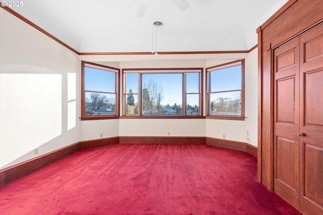 155 N 6th Ave, Elgin, OR 97827 - carpeted spare room featuring healthy amount of natural light, baseboards, and a ceiling fan