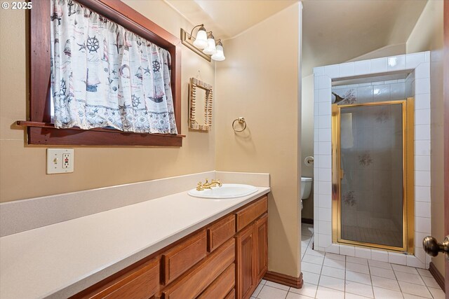 155 N 6th Ave, Elgin, OR 97827 - full bathroom with a shower stall, tile patterned flooring, vanity, and toilet