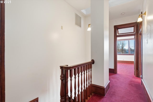 155 N 6th Ave, Elgin, OR 97827 - corridor with carpet floors, an upstairs landing, and baseboards