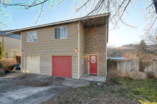 view of front of home with a garage