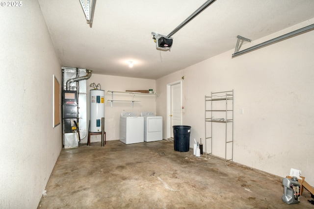 garage featuring a garage door opener, washing machine and dryer, and electric water heater