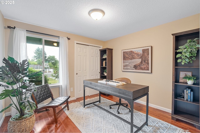 17616 SW Ivy Glenn Dr, Beaverton, OR 97007 - office space with a textured ceiling and wood finished floors