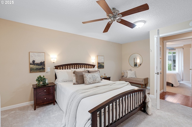 17616 SW Ivy Glenn Dr, Beaverton, OR 97007 - carpeted bedroom with a textured ceiling and ceiling fan