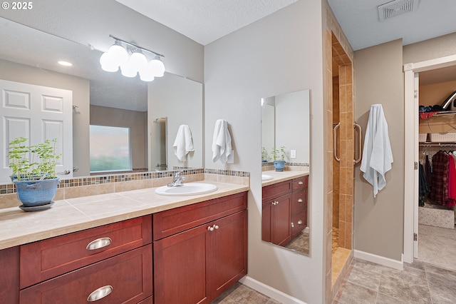 17616 SW Ivy Glenn Dr, Beaverton, OR 97007 - full bath with tiled shower, a spacious closet, and vanity