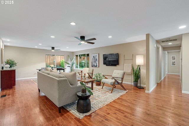 17616 SW Ivy Glenn Dr, Beaverton, OR 97007 - living room with light wood-style floors, recessed lighting, and ceiling fan