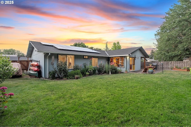 17616 SW Ivy Glenn Dr, Beaverton, OR 97007 - back of house at dusk featuring solar panels