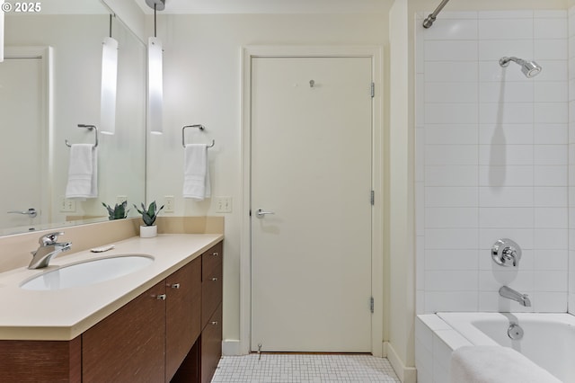 bathroom featuring bathtub / shower combination, vanity, and tile patterned floors