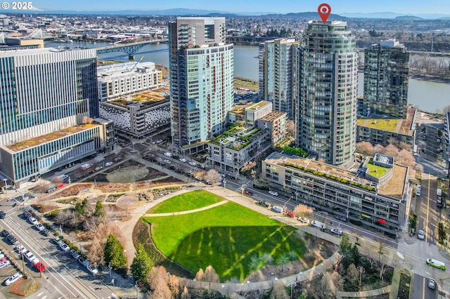 drone / aerial view with a water view and a city view