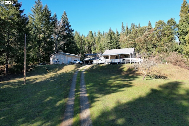 view of yard with a wooden deck