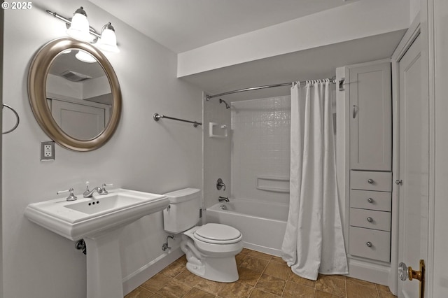 full bath with shower / bath combination with curtain, toilet, baseboards, and visible vents