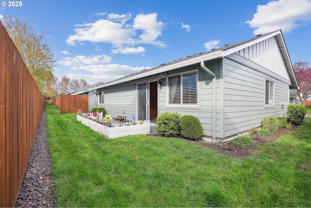 2383 SE 61st Ln, Hillsboro, OR 97123 - rear view of property featuring board and batten siding