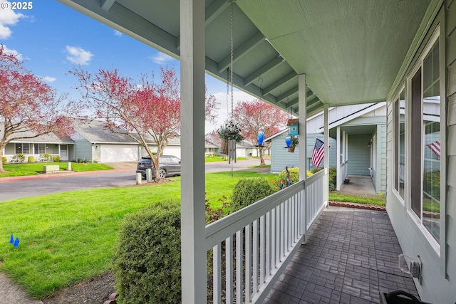 2383 SE 61st Ln, Hillsboro, OR 97123 - view of patio featuring covered porch and a residential view