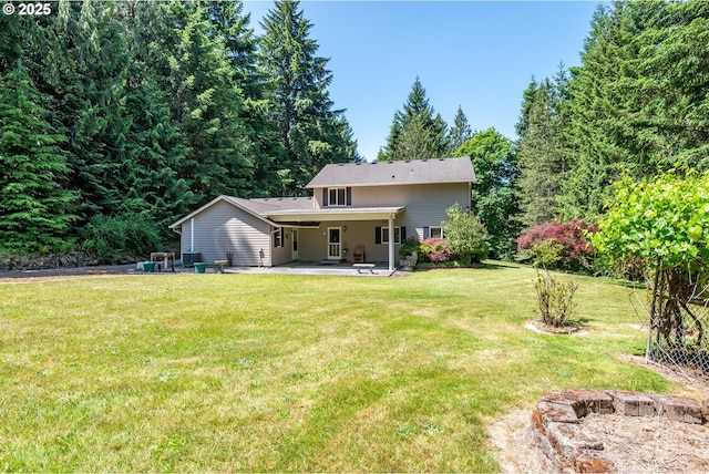 230 S Maple Hill Rd, Kelso, WA 98626 - back of property featuring a patio and a lawn