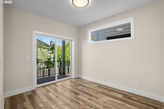 empty room featuring light hardwood / wood-style floors