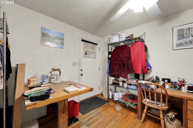 office with ceiling fan and wood finished floors