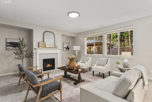 living room featuring a fireplace and light carpet