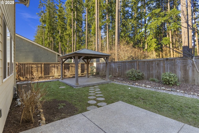 view of yard featuring a gazebo, a patio, and central air condition unit