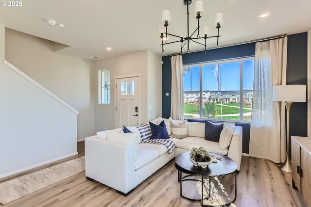 11331 NW Main St, North Plains, OR 97133 - living room with a chandelier, light wood-type flooring, recessed lighting, and baseboards