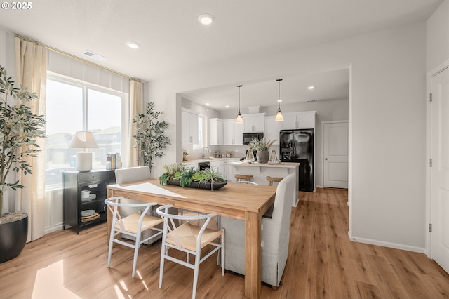 11331 NW Main St, North Plains, OR 97133 - dining area featuring recessed lighting, light wood finished floors, and baseboards