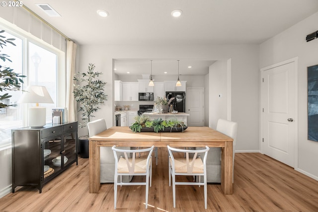 11331 NW Main St, North Plains, OR 97133 - dining area with light wood finished floors, recessed lighting, and baseboards