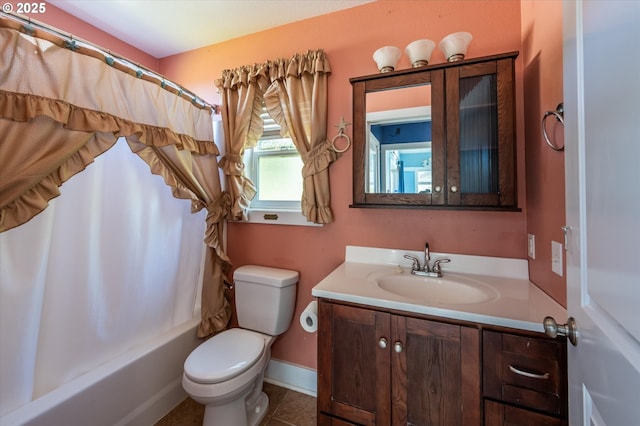 2318 Liberty St, North Bend, OR 97459 - full bathroom with toilet, vanity, shower / tub combo with curtain, and tile patterned flooring