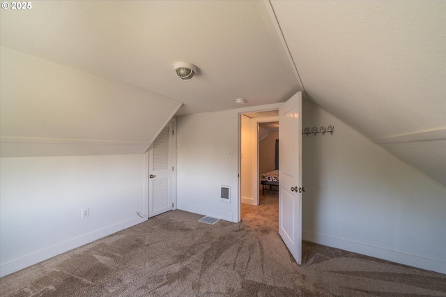 2318 Liberty St, North Bend, OR 97459 - bonus room with carpet flooring, lofted ceiling, and baseboards