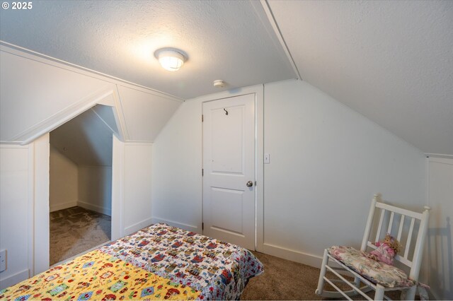2318 Liberty St, North Bend, OR 97459 - bedroom with a textured ceiling, carpet, and vaulted ceiling