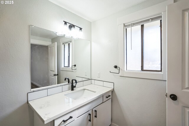 full bathroom with sink, toilet, and tiled shower / bath