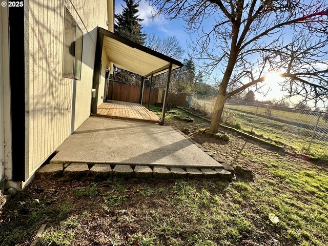 wooden terrace featuring a rural view