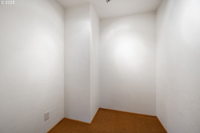 spare room with light colored carpet