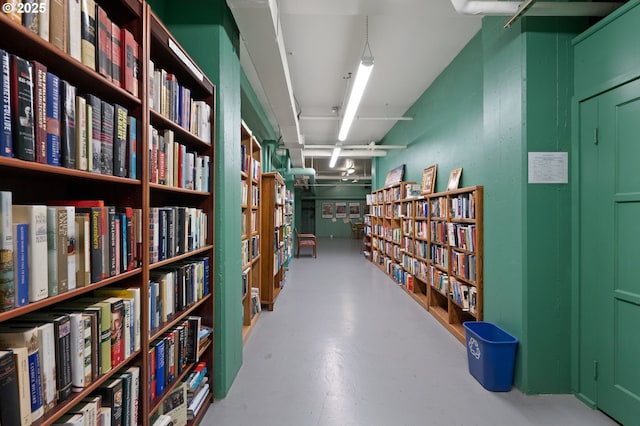 hallway with concrete floors