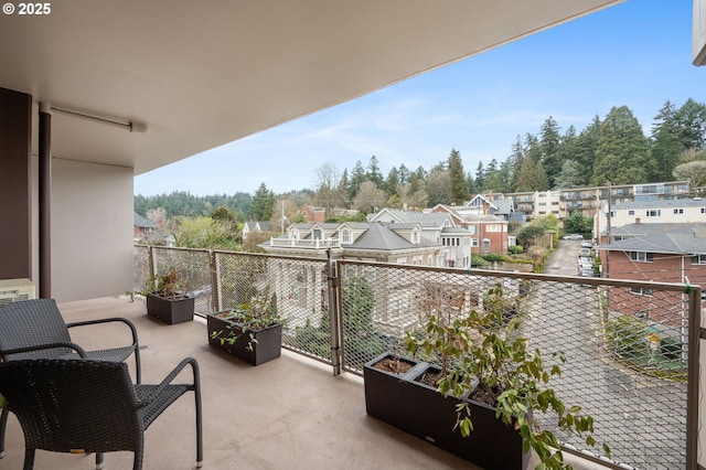 balcony featuring a residential view