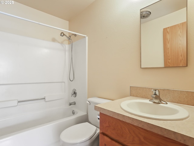 full bathroom featuring tub / shower combination, toilet, and vanity