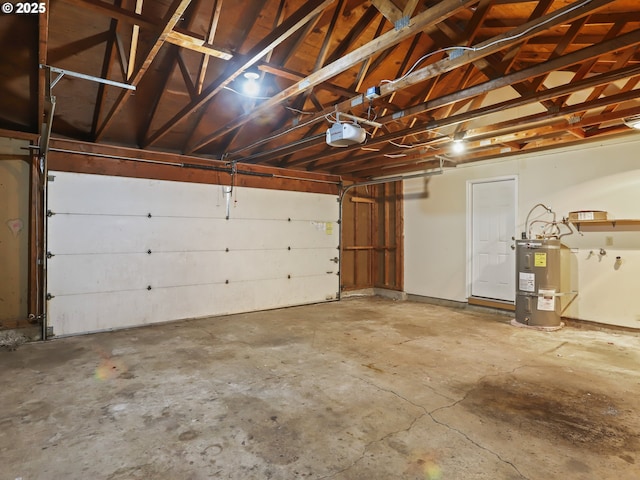 garage with strapped water heater and a garage door opener