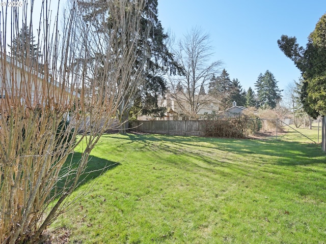 view of yard with fence